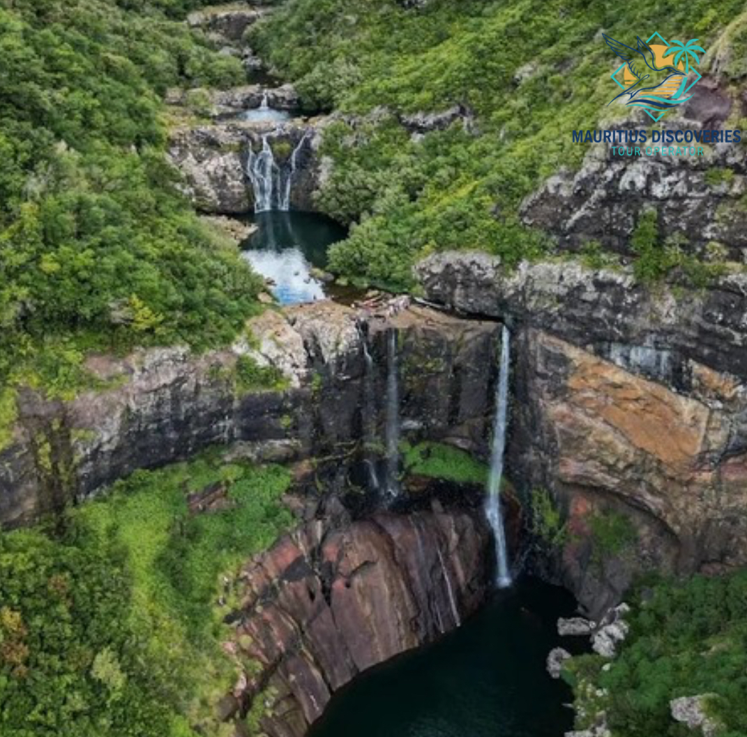 Waterfalls and forested cliffs at Tamarind Falls, also known as 7 Cascades, Mauritius