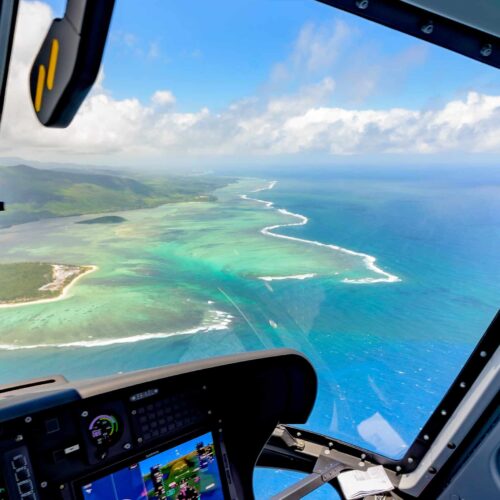 View of the Mauritius lagoon and reef from inside an MHL helicopter