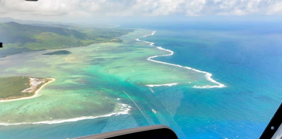 View of the Mauritius lagoon and reef from inside an MHL helicopter