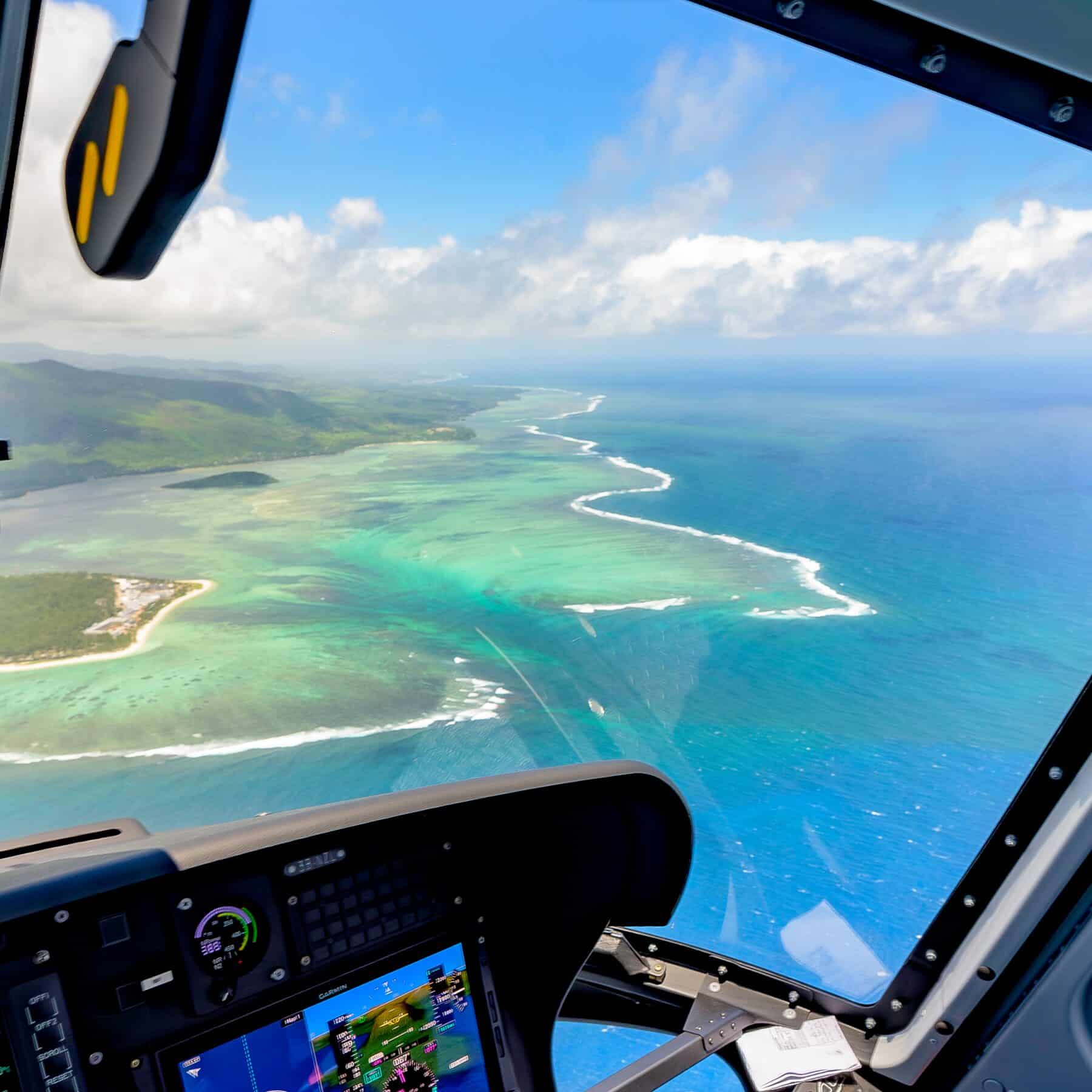 View of the Mauritius lagoon and reef from inside an MHL helicopter
